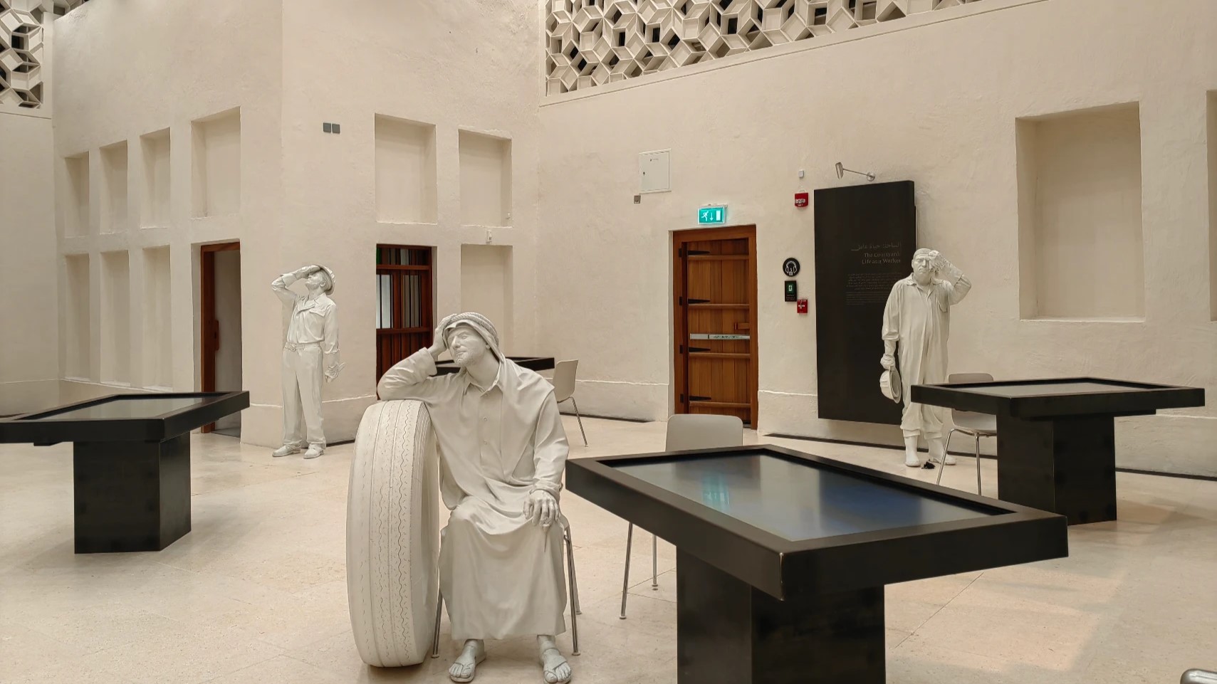 Statues of oil workers displayed inside Company House at Msheireb