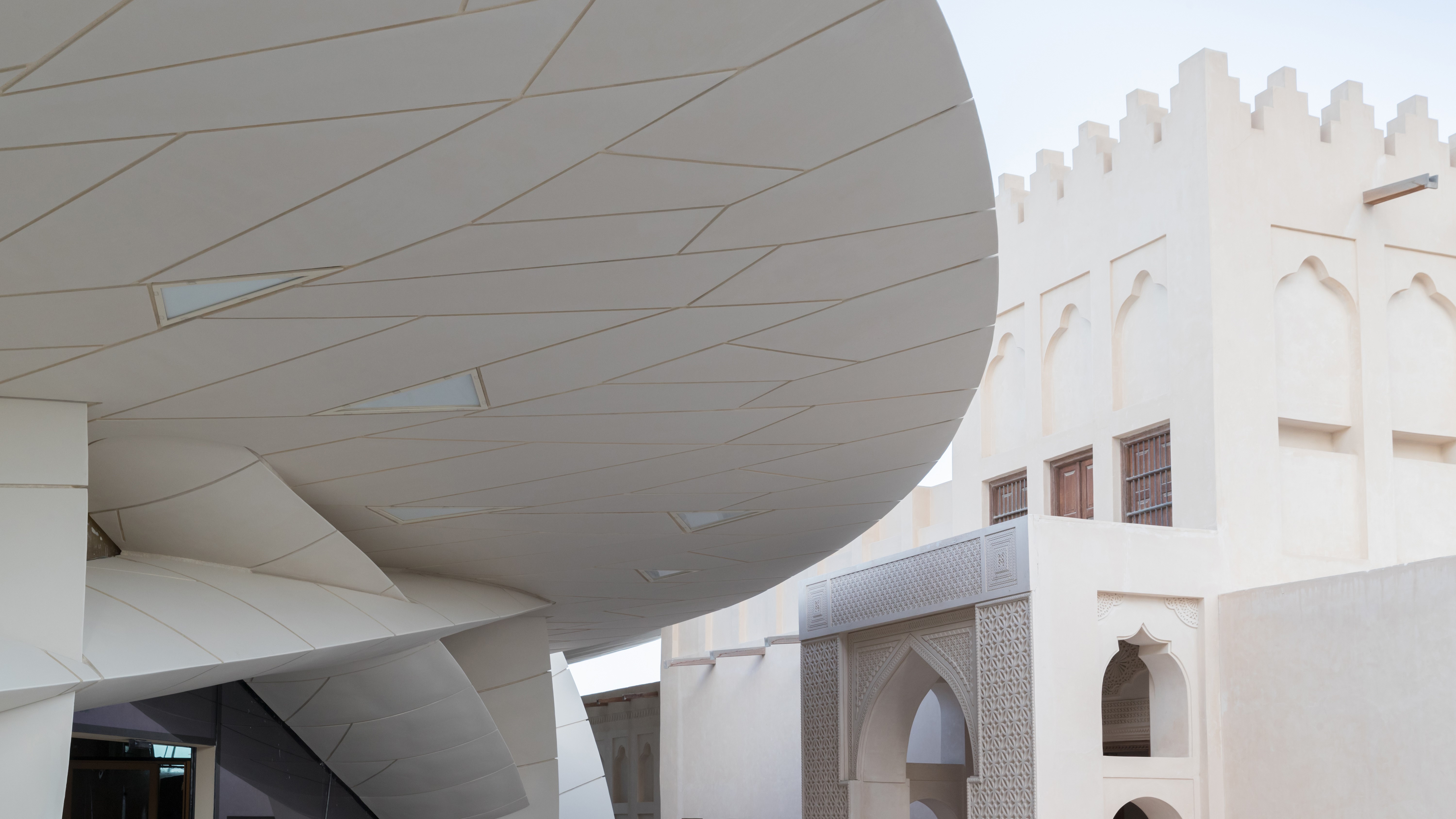 Museum disc underside beside the restored Sheikh Abdullah palace